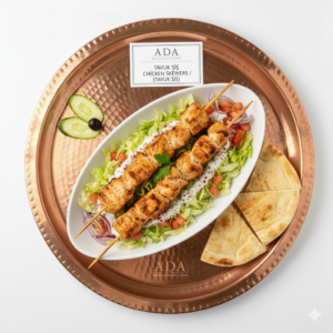 Tavuk Şiş – Grilled marinated chicken cubes on skewers served with rice, grilled vegetables at Ada Mediterranean Cuisine Grill