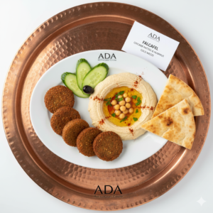 Falafel – Chickpea patties with onions, celery, garlic, herbs, and spices, served with hummus at Ada Mediterranean Cuisine Grill, Middle Island NY