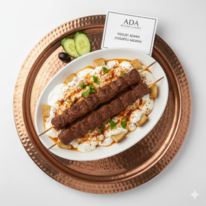 Yogurt Adana – Grilled spiced beef served with garlic yogurt sauce at Ada Mediterranean Cuisine Grill